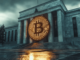 Bitcoin symbol with Federal Reserve in the background, indicating potential rate cut impact.