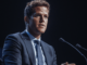 Tyler Winklevoss speaking at a cryptocurrency conference.
