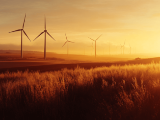 MARA Holdings logo with Bitcoin and a wind farm in the background, symbolizing renewable energy mining operations.
