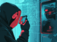 Illustration showing a crypto hacker targeting a user through a phishing attack on a mobile wallet