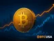 Digital Bitcoin over trading charts and bullish projections symbolizing Coinbase’s optimistic market outlook