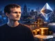 Cinematic portrait-style illustration of Vitalik Buterin representing Ethereum’s evolution toward a scalable, decentralized world computer with a calm, minimal tech background.