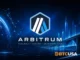 Futuristic Arbitrum hero image with glowing blue blockchain network, digital globe, modern city skyline, and Arbitrum branding in a dark cinematic tech environment
